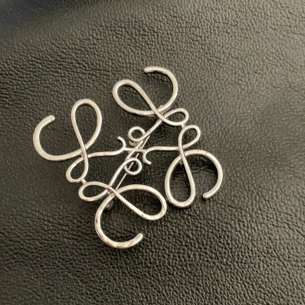 Silver L brooch